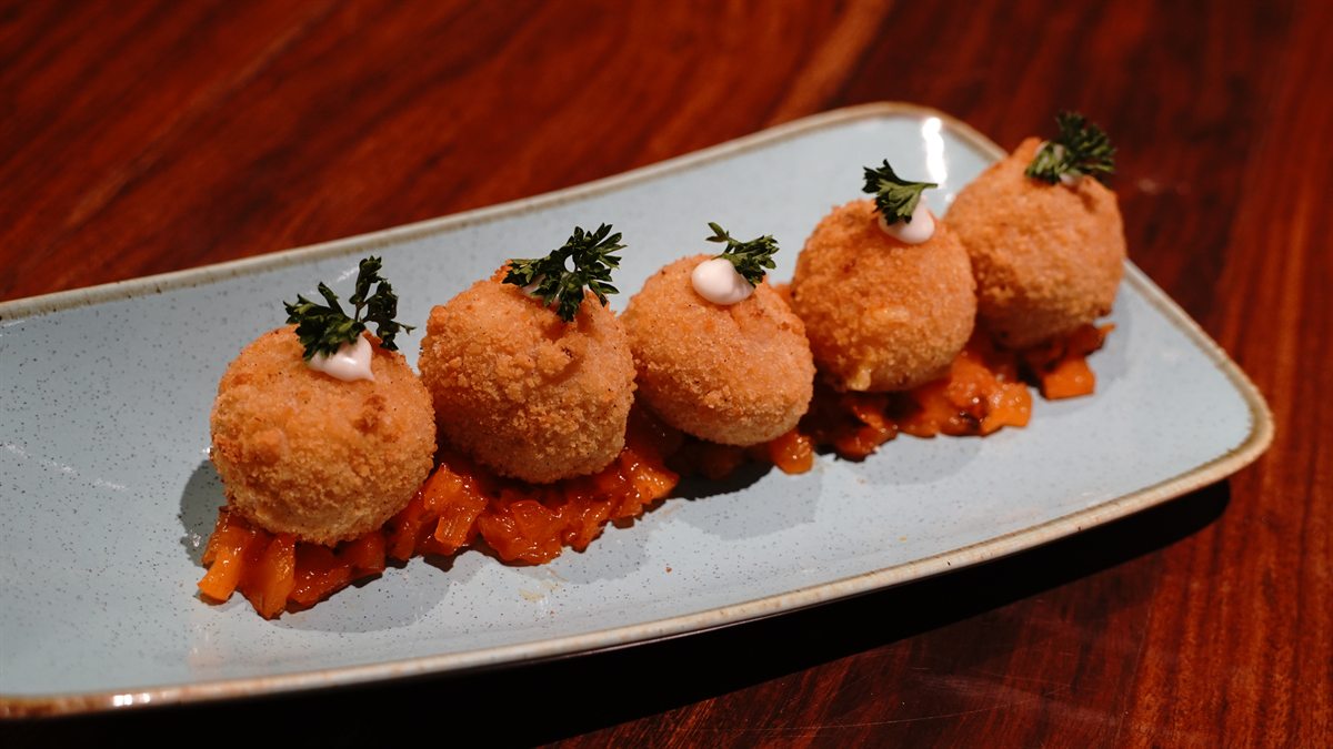 Cheese balls plated for a birthday celebration at Nineteenth May