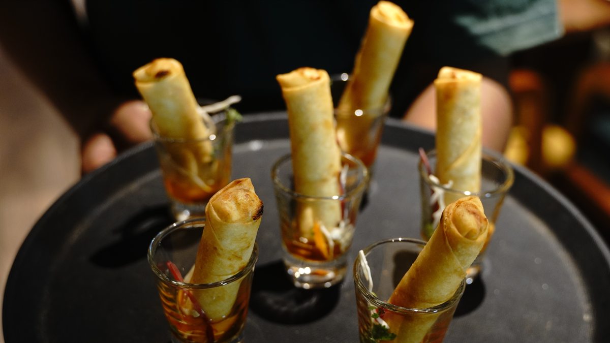 Crisp appetisers served in individual glasses for a birthday party