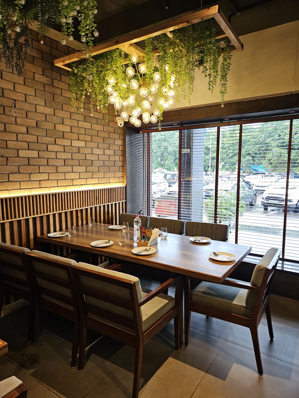 Window-side family dining table at Nineteenth May